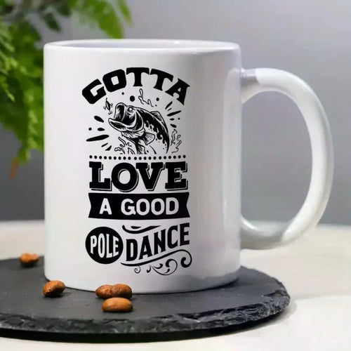 " GOTTA LOVE A GOOD POLE DANCE " Coffee Mug With Fish Pattern ,11 Oz.